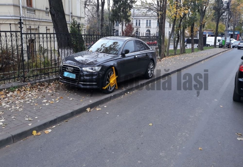 FOTO: Pus la plată după ce a parcat aiurea!