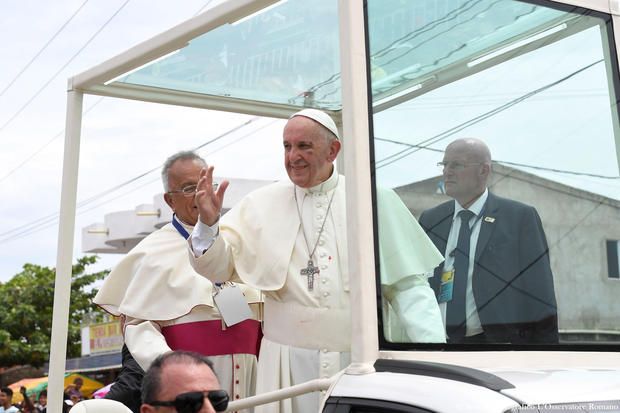 Pope Francis greets faithful from his popemobile in Cartagena