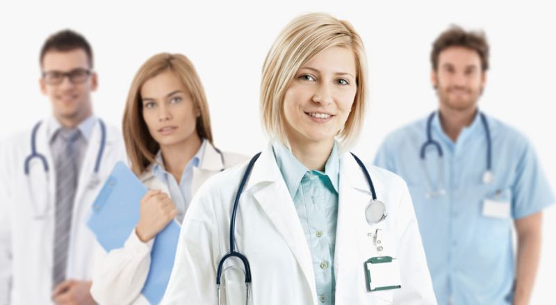 Young medical doctors smiling at camera