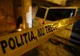 Polițist luat pe capotă de un șofer. Agentul a folosit arma din dotare