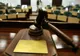 Persoană trimisă în judecată pentru trafic de influență